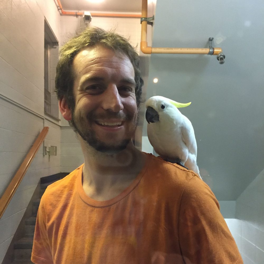Eric Hall in treatment in October 2016, a cockatoo on his shoulder