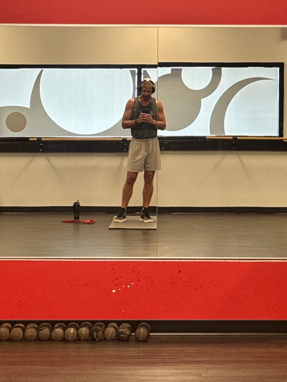 Eric Hall in a gym mirror, nine years into recovery